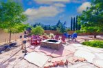 Outdoor firepit and Adirondack chairs